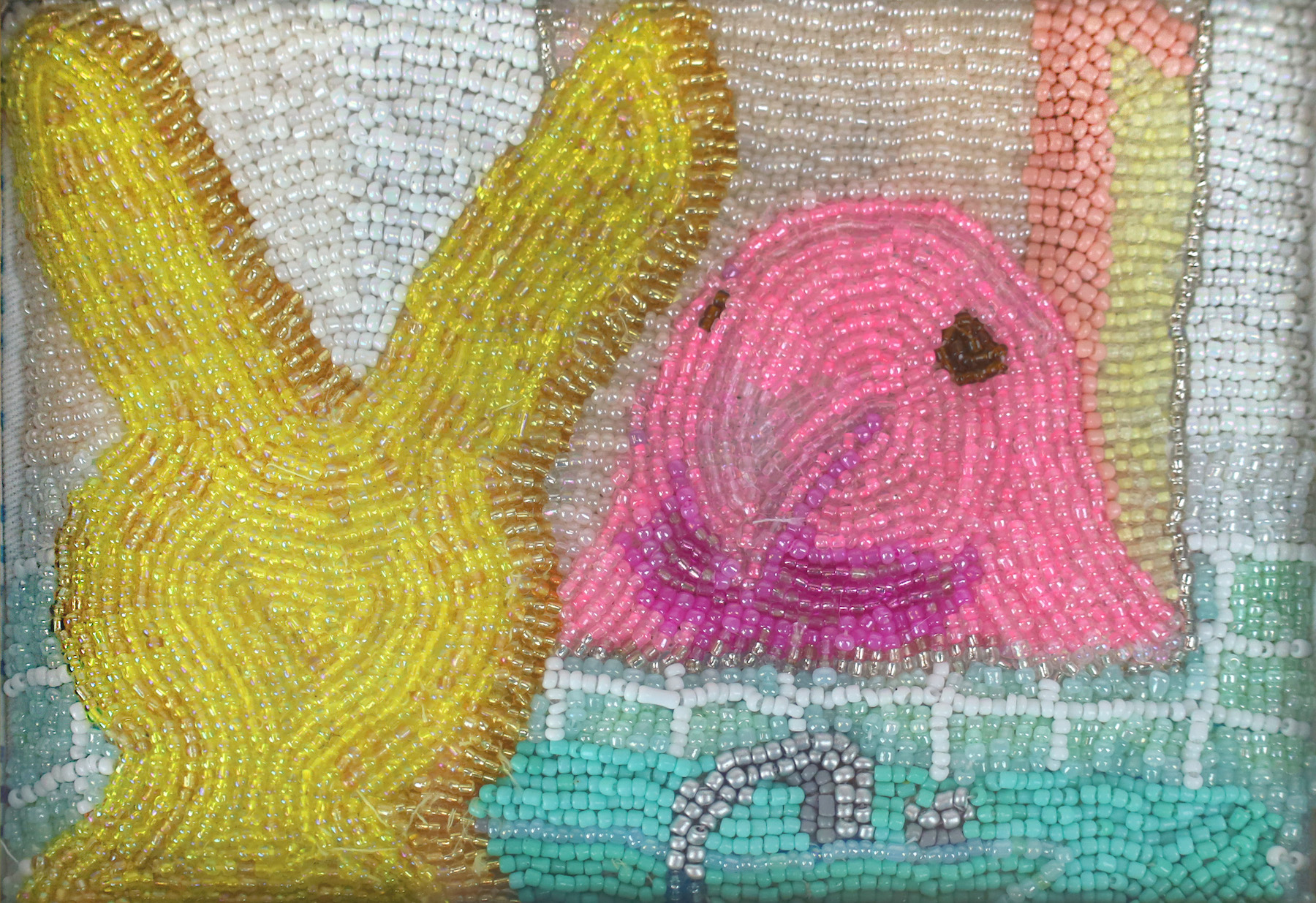 Amy Zygmunt, Beauty Is Only Sugar Deep Beads, arranged into a picture. A yellow bunny peep looks into a bathroom mirror, only to see a pink chick peep in its reflection.