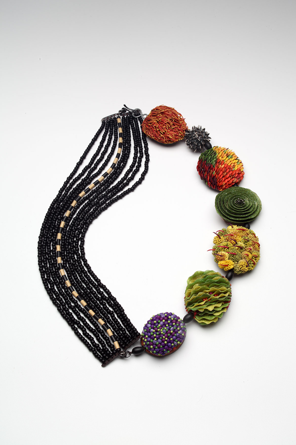 Kathleen Dustin, Autumn Drive Neckpiece Neckpiece with strings of beads on one half and various organic shapes on the other