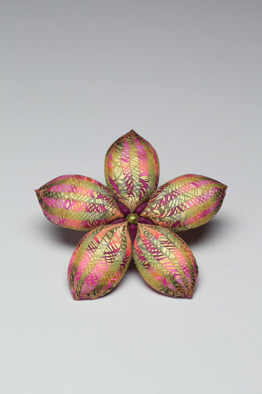 Elise Winters “Pentala Brooch” Flower-shaped brooch